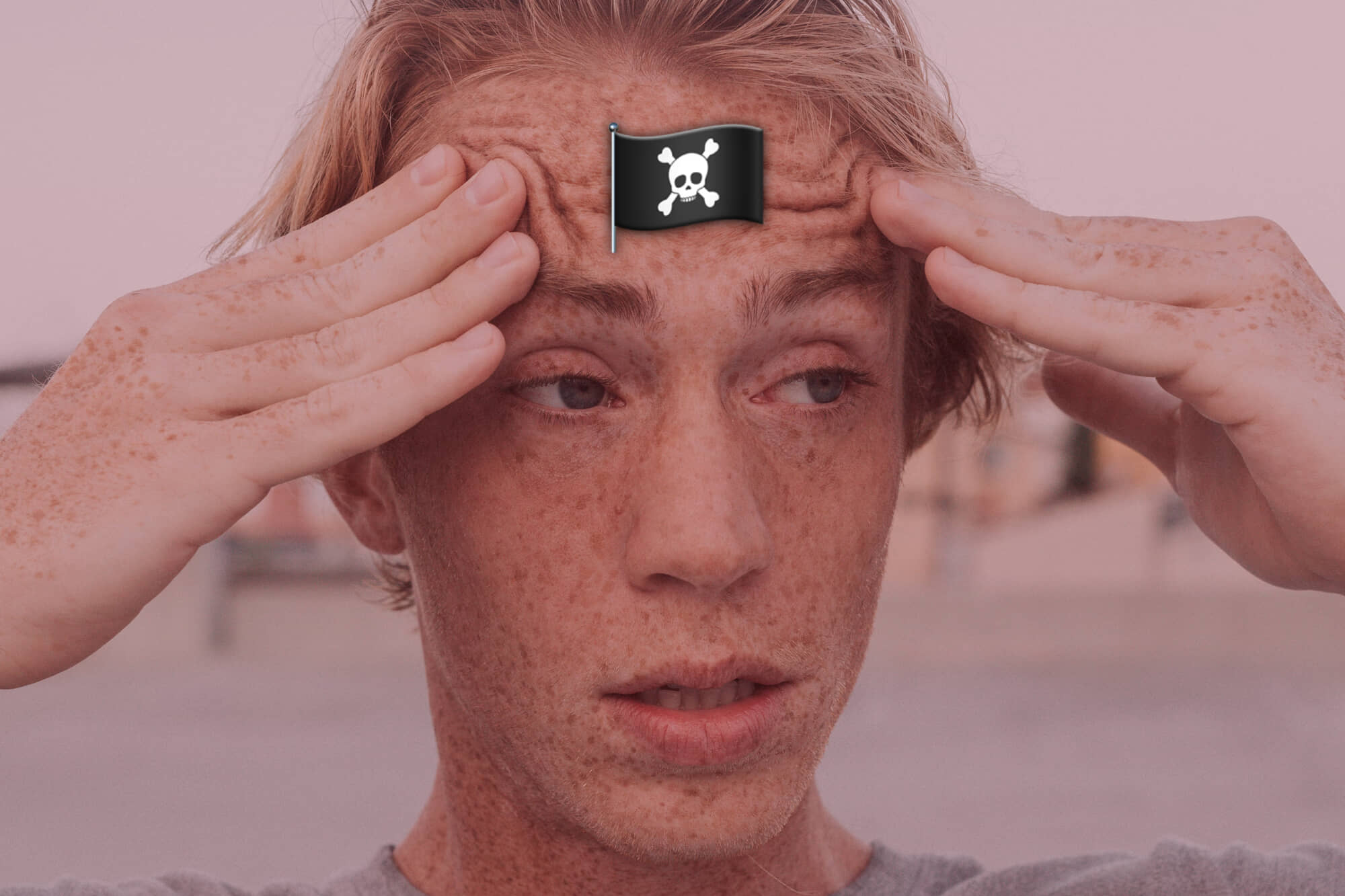 confused man with a pirate flag on his head