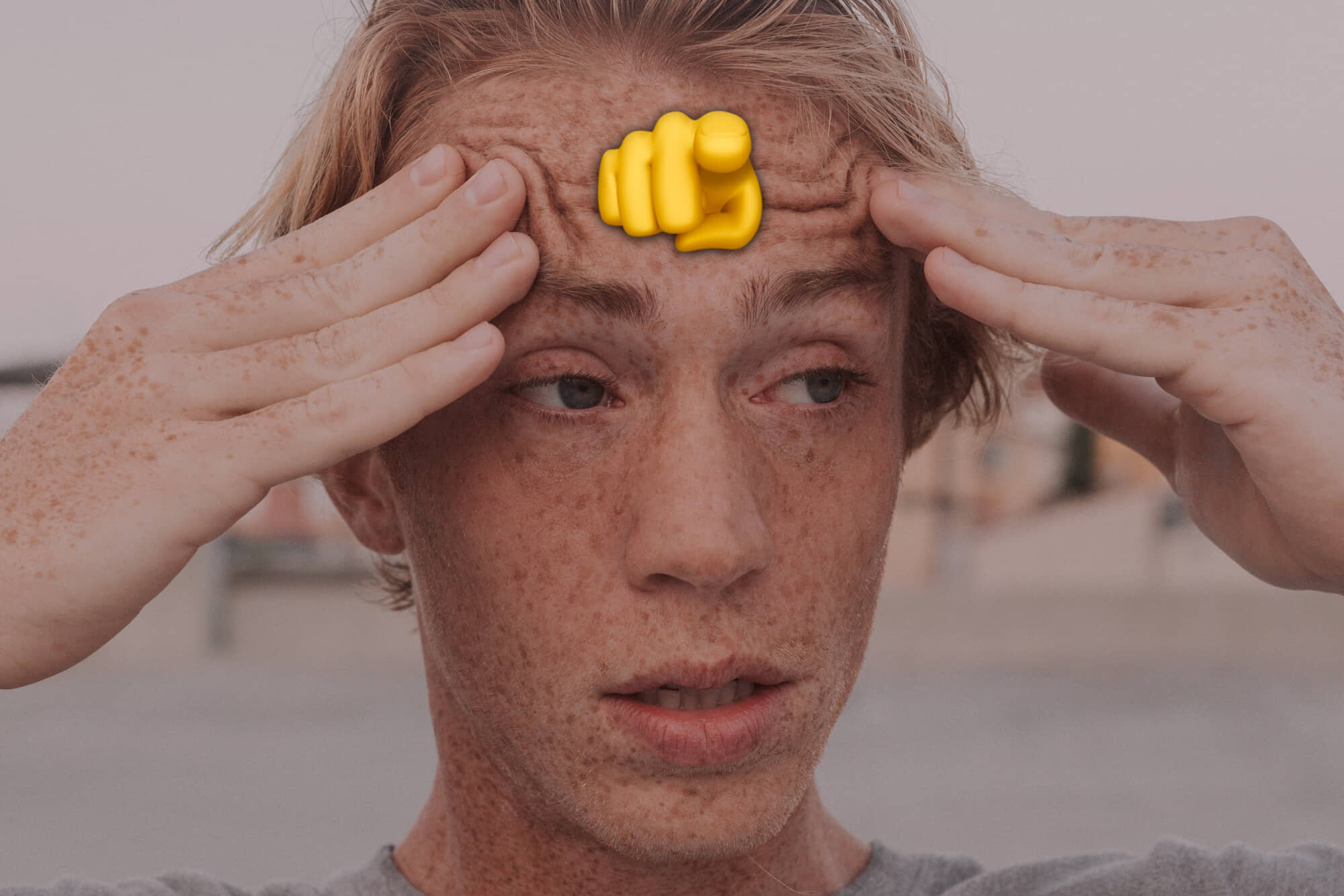 confused man with a hand pointing on his forehead
