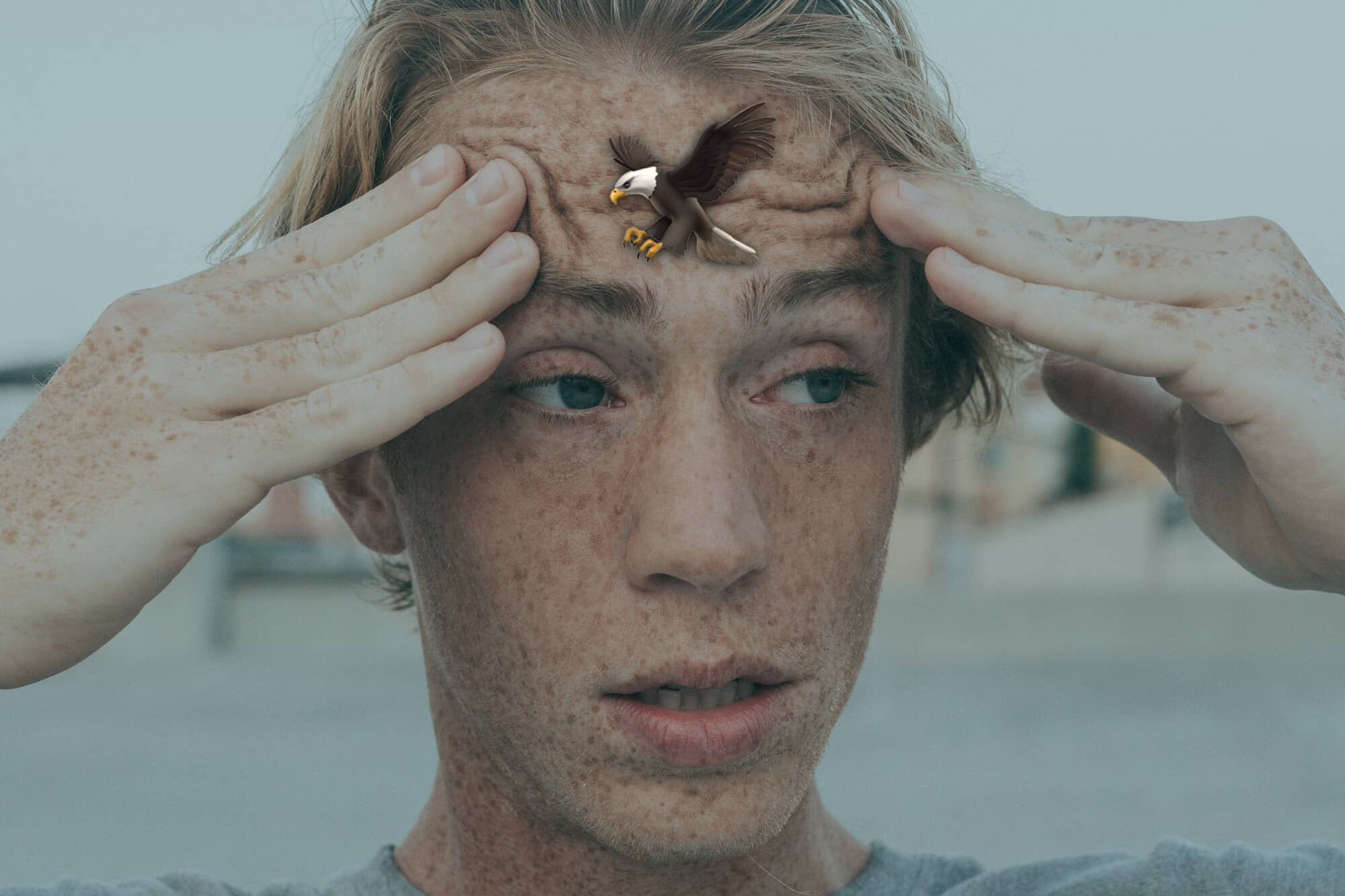 confused man with an eagle emoji on his forehead
